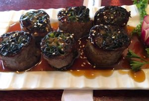 Negimaki - Thin-sliced meat wrapped around veggies