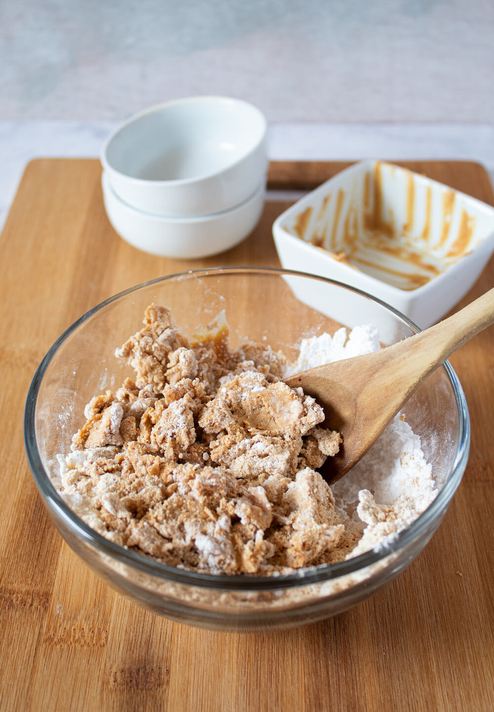 Keto Skippy PB Bites mixing ingredients in bowl