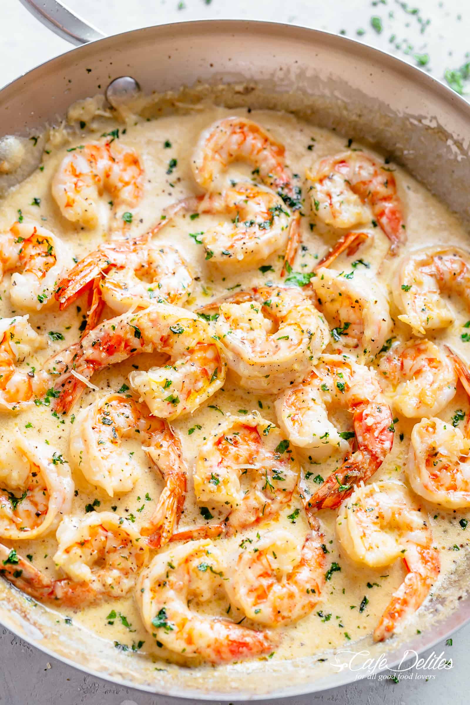 Creamy Garlic Keto Shrimp Recipe - Delicious shrimp in a white cream sauce.