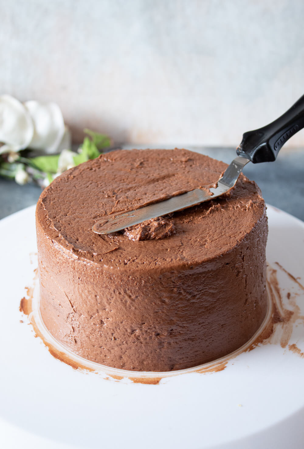 Keto Birthday Cake Recipe - Frosting the low carb birthday cake